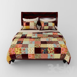 Bed - Bed with a patchwork 