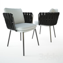 CONTEMPORARY CHAIR WITH ARMRESTS UPHOLSTERED WITH REMOVABLE CUSHION 