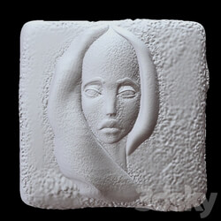 Sculpture - Face on stone 