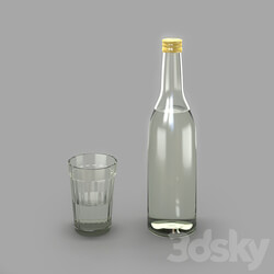 Food and drinks - Faceted glass with a bottle of chacha 