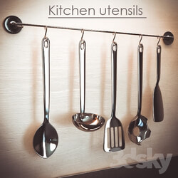 Hanging on the wall of cookware 