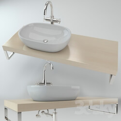 Washbasin on the wooden plate 