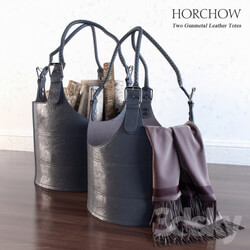 Other decorative objects Two Gunmetal Leather Totes 