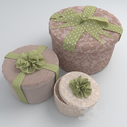 Set of round gift boxes with bows 