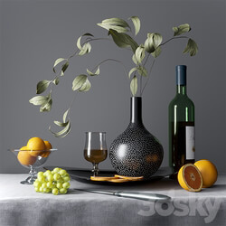 Still life with fruits dishes and cognac 