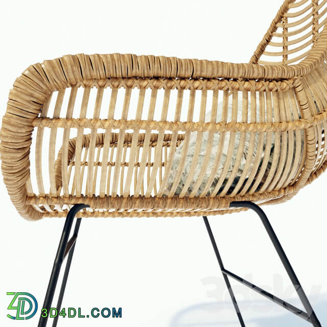 Hübsch rattan chair with metal legs