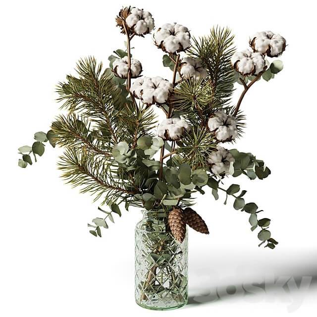 Bouquet of eucalyptus pine and cotton in a glass vase