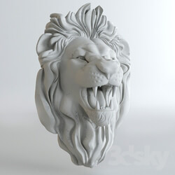 Plaster head of a lion 