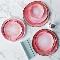 Set of plates in a pink glaze irregular shape 