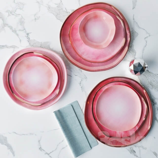 Set of plates in a pink glaze irregular shape
