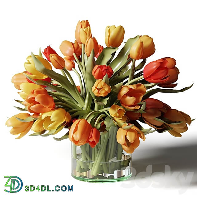 Yellow red and white tulips in glass vases