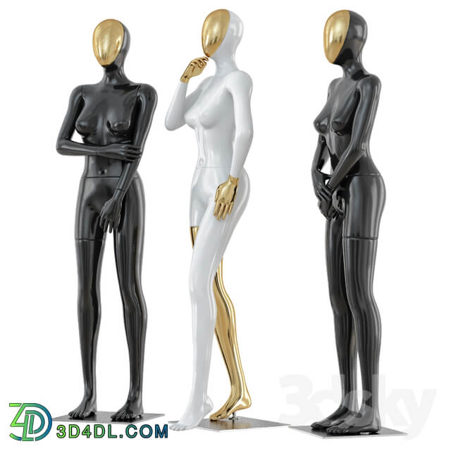 Three female mannequin with a golden face 41