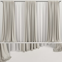 Wide brown curtains with tulle. 