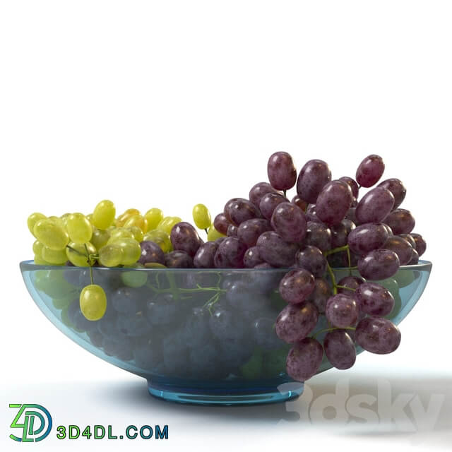 Bunches of grapes in a glass bowl