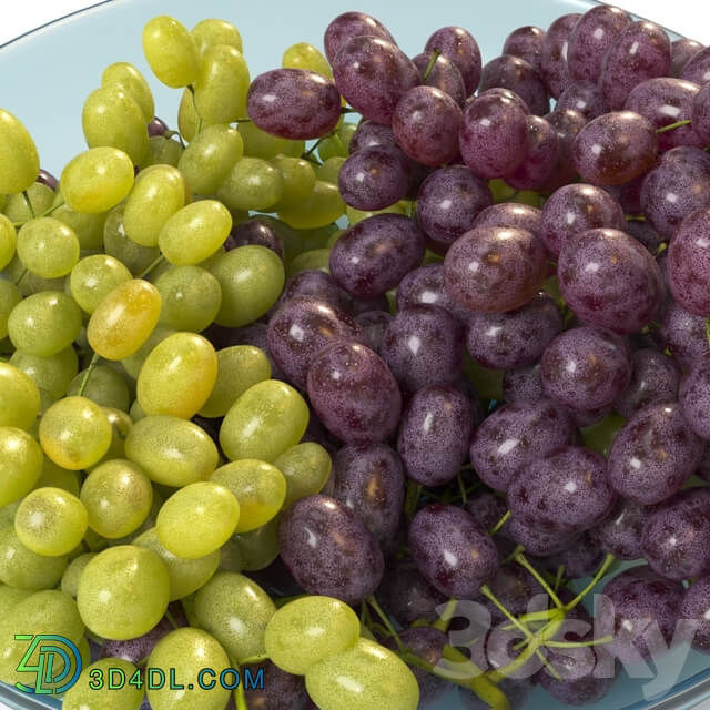 Bunches of grapes in a glass bowl