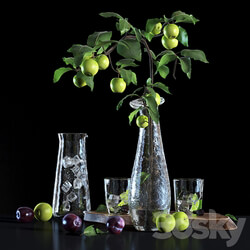 Water with lime and apple tree branch 