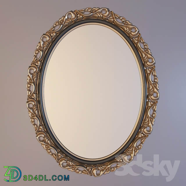 oval mirror in a carved frame