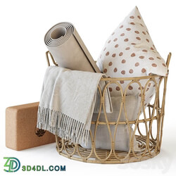 Wicker basket with yoga accessories 