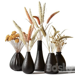 Set of bouquets of dried flowers in black clay vases 