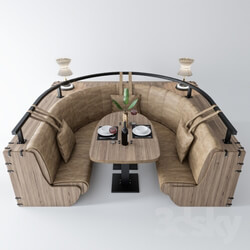 Semicircular sofa with table and decor 