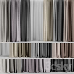 A set of curtains in different colors tulle. 