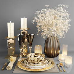 Decorative set with dishes and a bouquet of white flowers 
