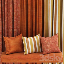 set of fabric materials in orange tones 