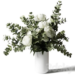 Bouquet with eucalyptus and peonies in a white vase 