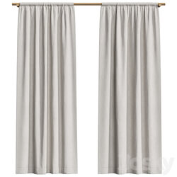 Linen curtains on a wooden cornice 