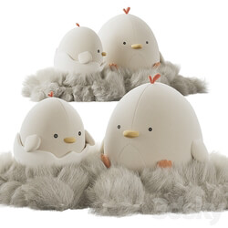 Cute plush chickens in a nest 