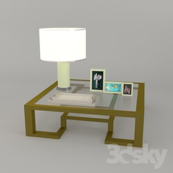 Table - golden table with sets of decorative items 