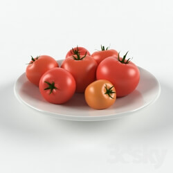 Food and drinks - tomatoes on a plate 