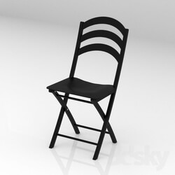 Table - Black folding chair 